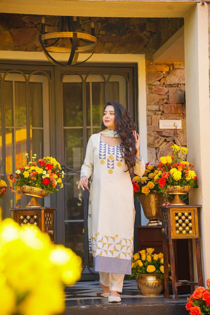Elegant Off White Muslin Printed Suit Set